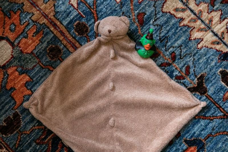 The brown bear lovey and rubber ducky belonging to Sabrina Siddiqui’s daughter; Sabrina had brought the items to Ukraine