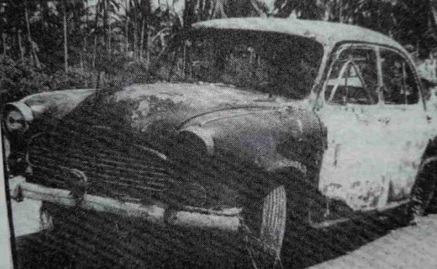 The burnt Ambassador car in Chacko