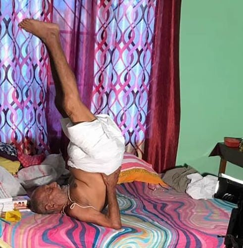 The yoga teacher Sivananda practising Yoga