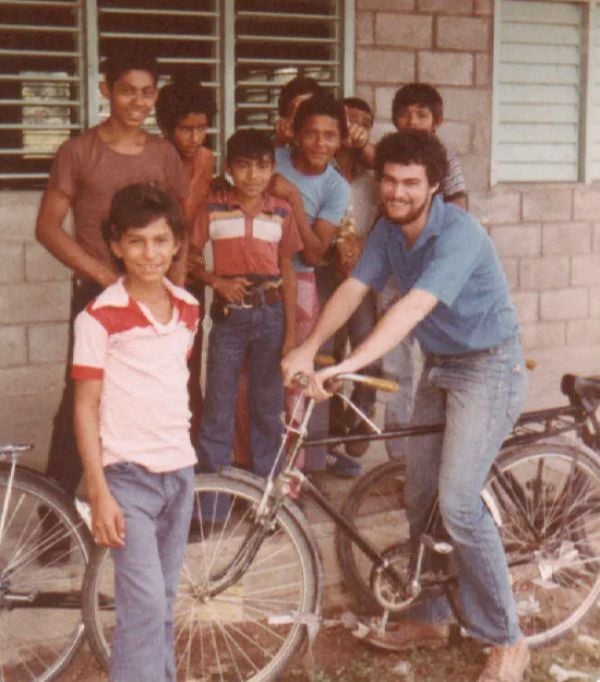 Tim Kaine (right) with students in El Progreso, Honduras, in September 1980