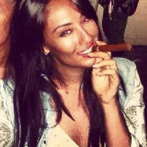 Tina Thadani smoking cigar