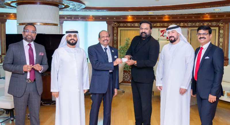 Tini Tom while receiving the UAE Golden Visa