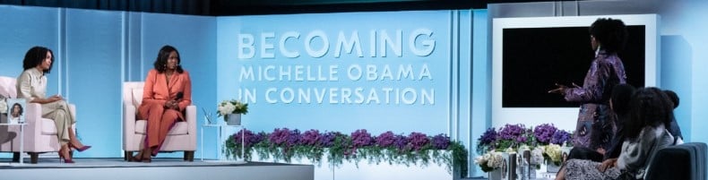 T’kor Clottey (standing right) during a conversation with Michelle Obama and Yara Shahidi