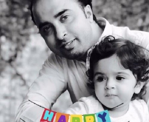 Toddler Asmi Deo with her father