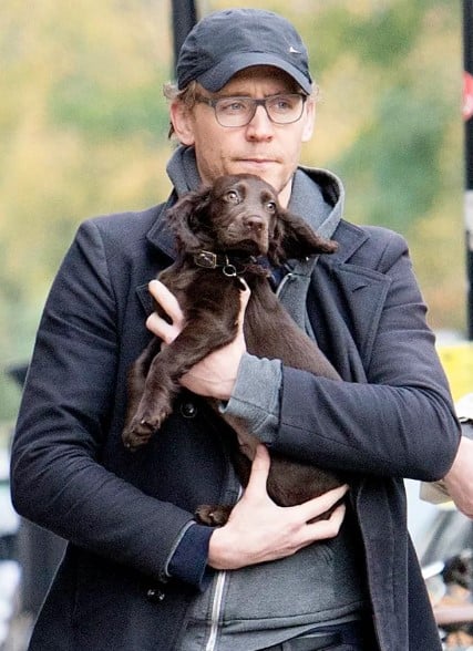 Tom Hiddleston posing with his pet