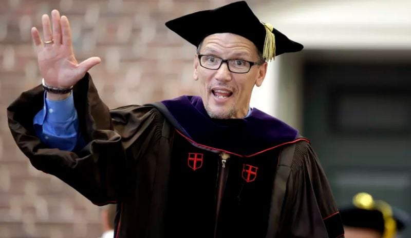 Tom Perez waves after being awarded an honorary degree during commencement services on the campus of Brown University in May 2014