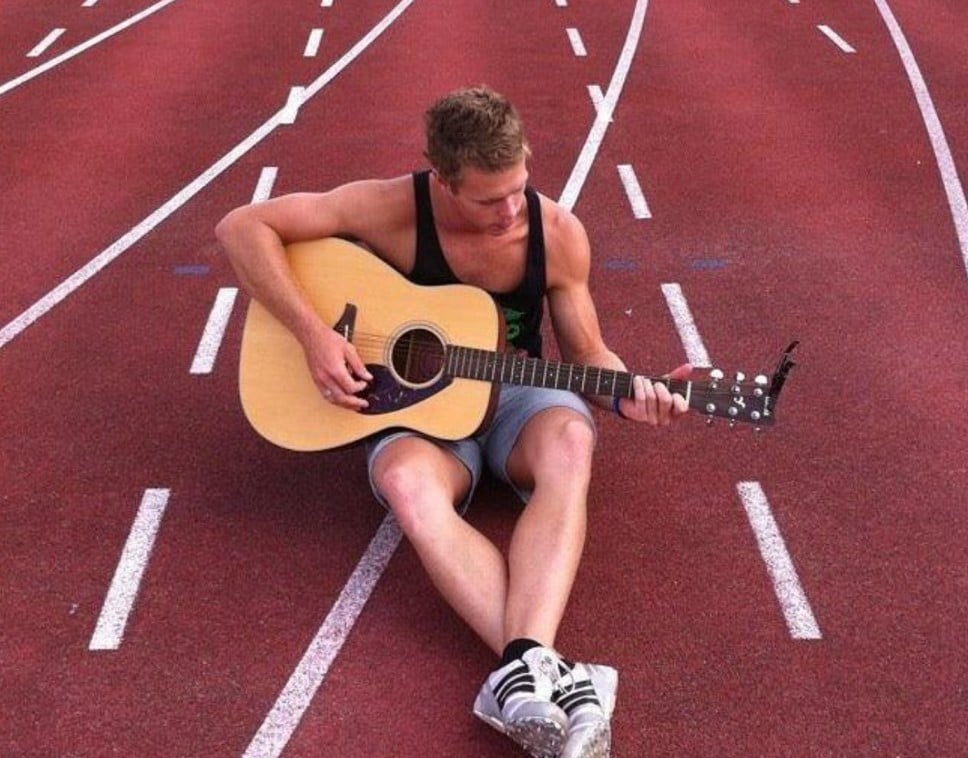 Tommy Oswald, while playing guitar