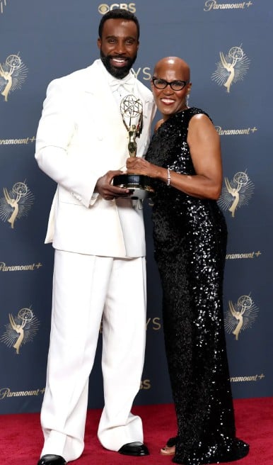 Tramell Tillman with his mother in the press room after winning the Outstanding Supporting Actor in a Drama Series award for 