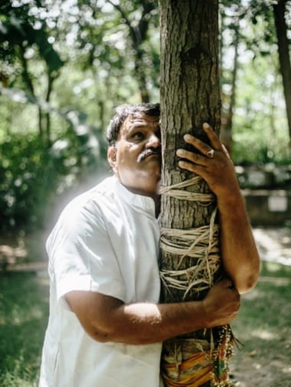 Shyam Sunder Paliwal Hugging a Kadam Tree in the Remembrance of His Daughter Kiran