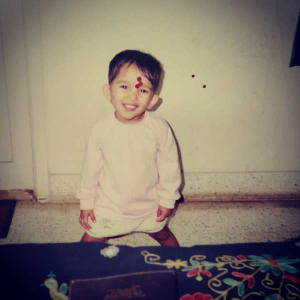 Trinetra Haldar Gummaraju while wearing bindis when she was a kid
