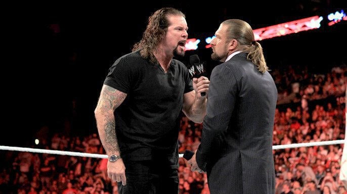 Triple H and Kevin Nash having a heated argument before Nash got fired