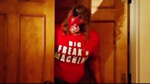 Triple H dressed as Kane