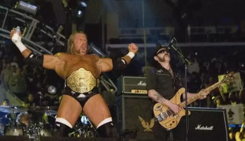 Triple H making an entrance into the arena while Lemmy Kilmister sang his theme song live