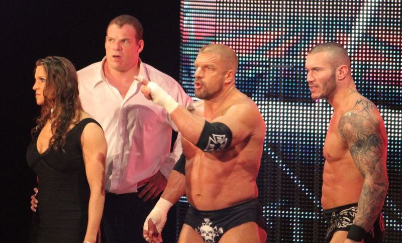 Triple H with the members of The Authority