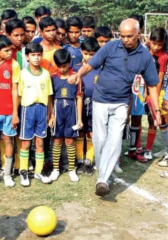 Tulsidas Balaram clicked while showing basic football techniques to budding footballers