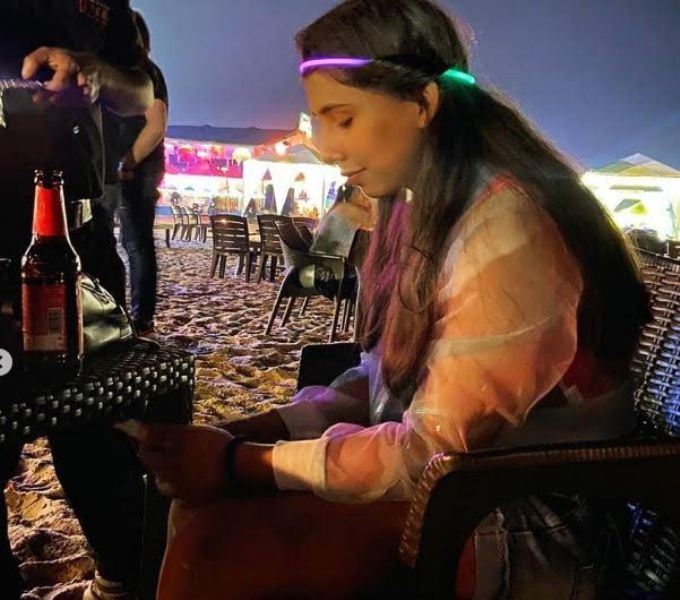 Twinkle Chourasia enjoying a beer in Goa