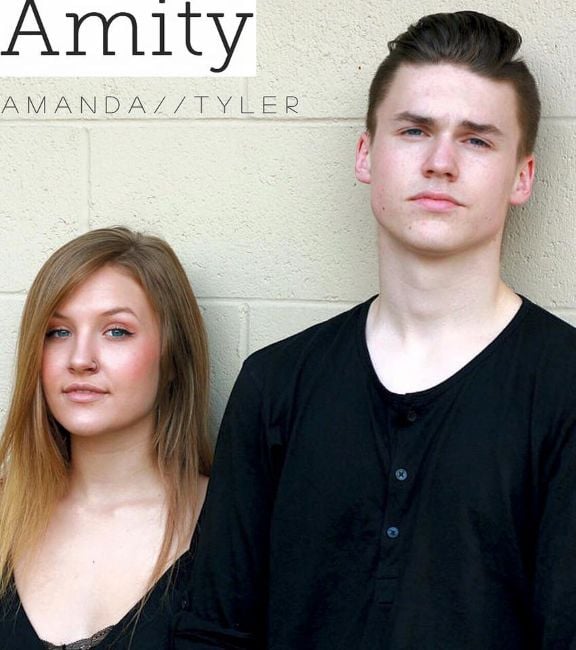 Tyler Breshears and Amanda Wooning on the poster of their band, Amity