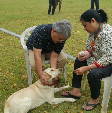 Umesh Upadhyay with his wife and pet dog