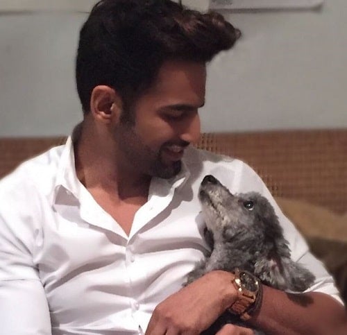 Upen Patel with his pet dog