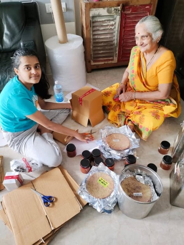Urmila Jamnadas Asher while packing up orders