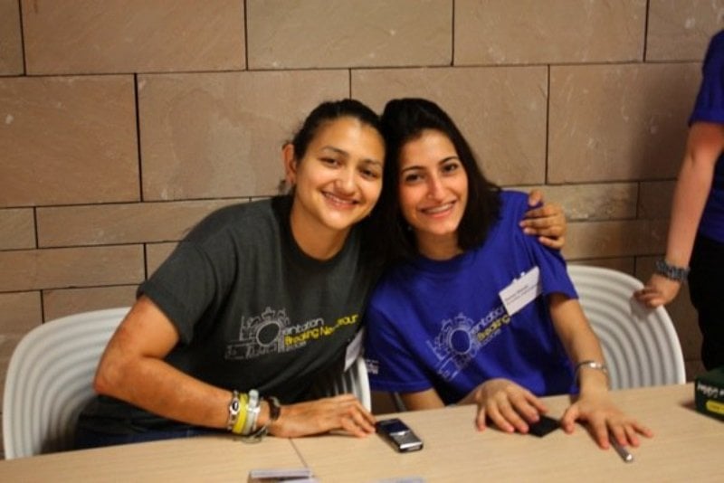 Urmila Rosario (left) while working in Qatar