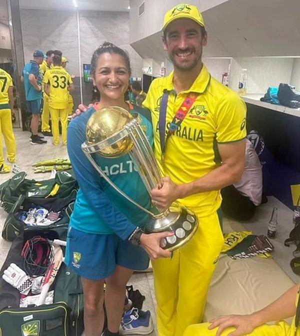 Urmila Rosario with Mitchell Starc (right) after Australia won the 2023 ODI World Cup