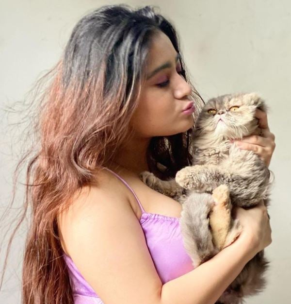 Urusa Javed with a cat