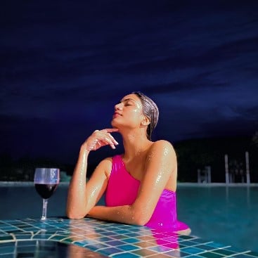 Urvi Shetty while enjoying wine