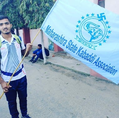 Vaibhav Garje while unfurling the flag of the Maharashtra State Kabaddi Association