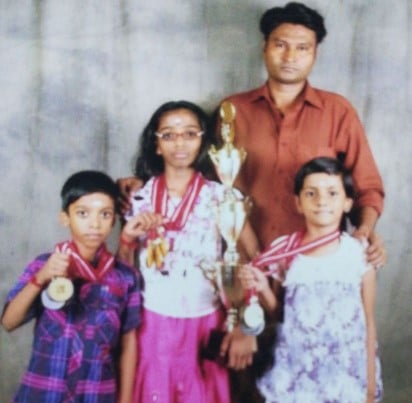Vaishali and Praggnanandhaa with Coach Thiyagarajan