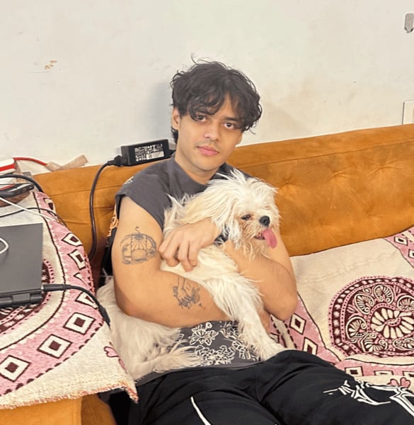 Vanshaj Singh with his pet dog