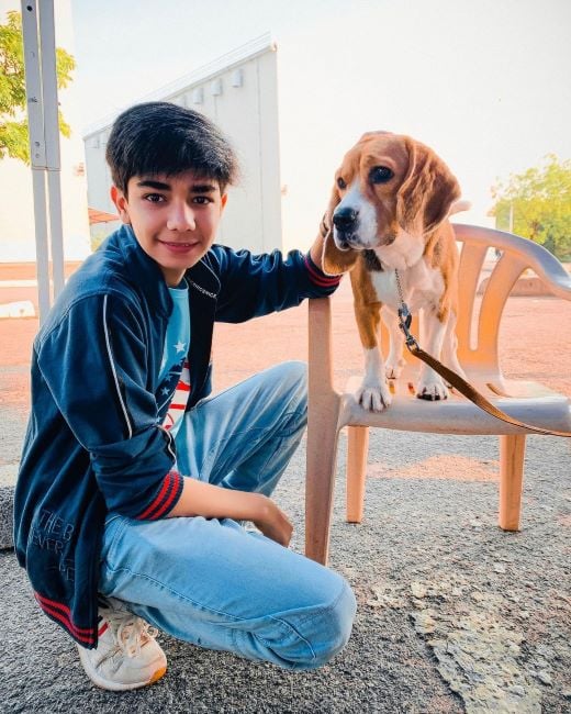 Varun Buddhadev with a dog