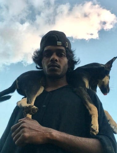 Vedan posing with his pet