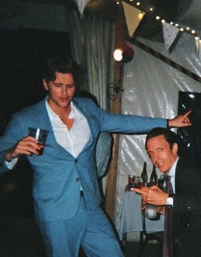 Vetle Dale Svendsen holding a glass of alcohol