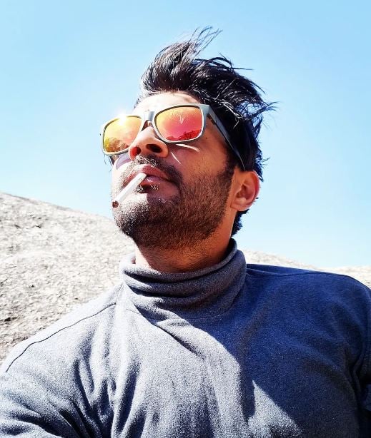 Vijay Krishna smoking in public