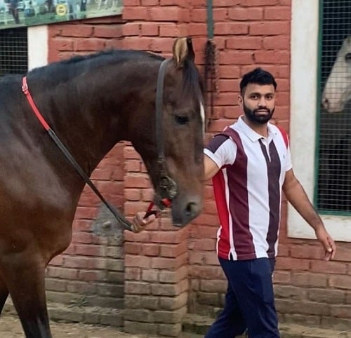 Vijay Malik with a horse