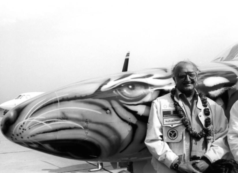 Vijaypat Singhania with a Cessna Conquest painted like a tiger