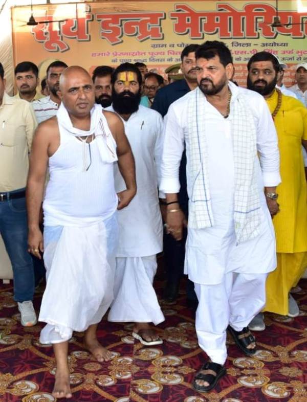 Vikas Singh with Brij Bhushan Sharan Singh (right)