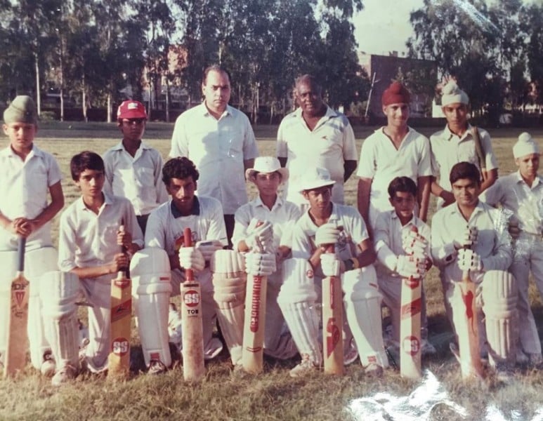 Vikrant Gupta (sitting third from right) with his Under 15 cricket team players in Chandigarh