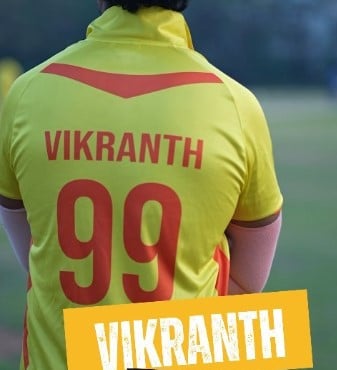 Vikranth Santosh while showing his jersey number during his participation in the Celebrity Cricket League