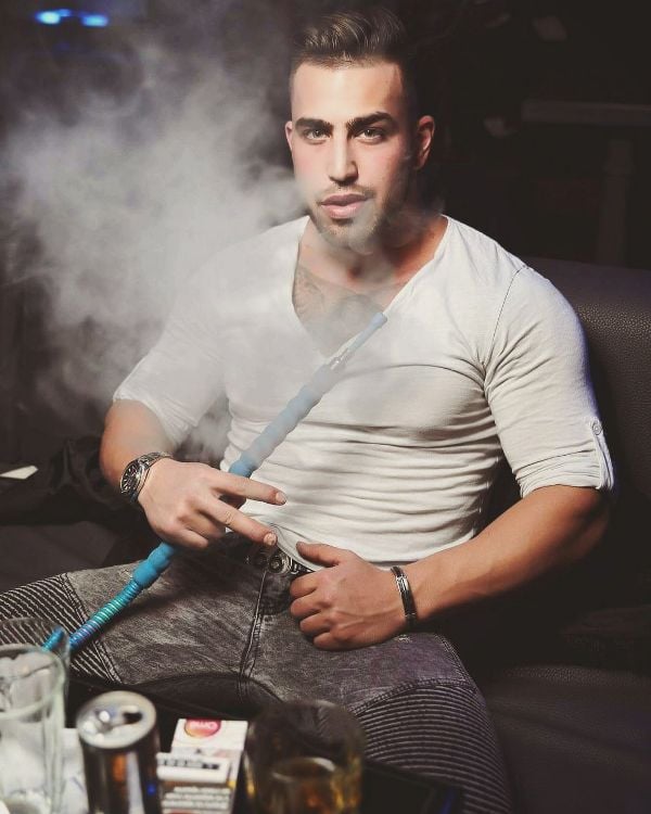 Viktor Angelov while smoking hookah