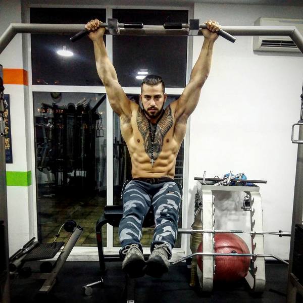 Viktor Angelov while working out at a gym