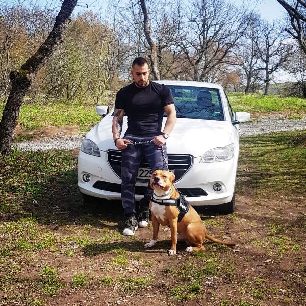 Viktor Angelov with his pet dog