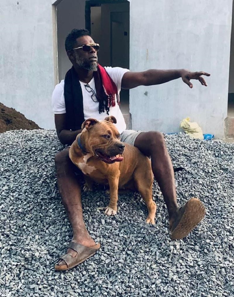 Vinayakan posing with his dog