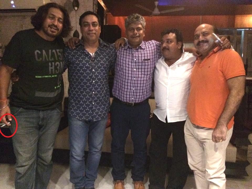 Vinod Kapri smoking cigarette