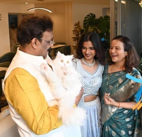 Vinod Tawde with his family and cat