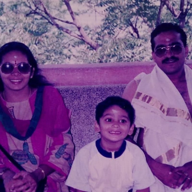 Vishak Nair as a child with his parents