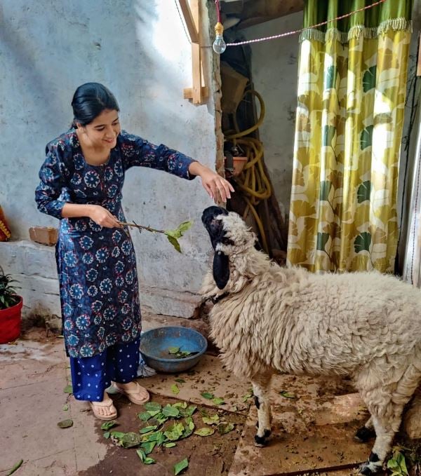 Vishakha Pandey with a goat