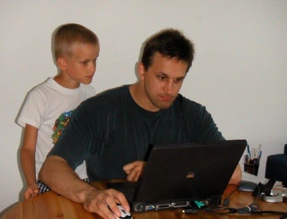 Vitalik Buterin while watching his father working on a laptop