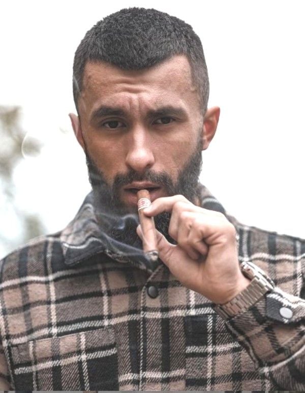 Vladimir Shmondenko smoking a cigarette